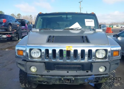 2003 Hummer H2 z USA, uszkodzony, nr VIN 5GRGN23U33H132653